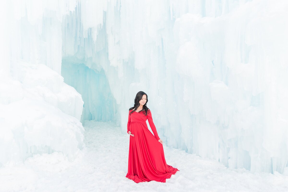 Red dress maternity session in Dillon, Co
