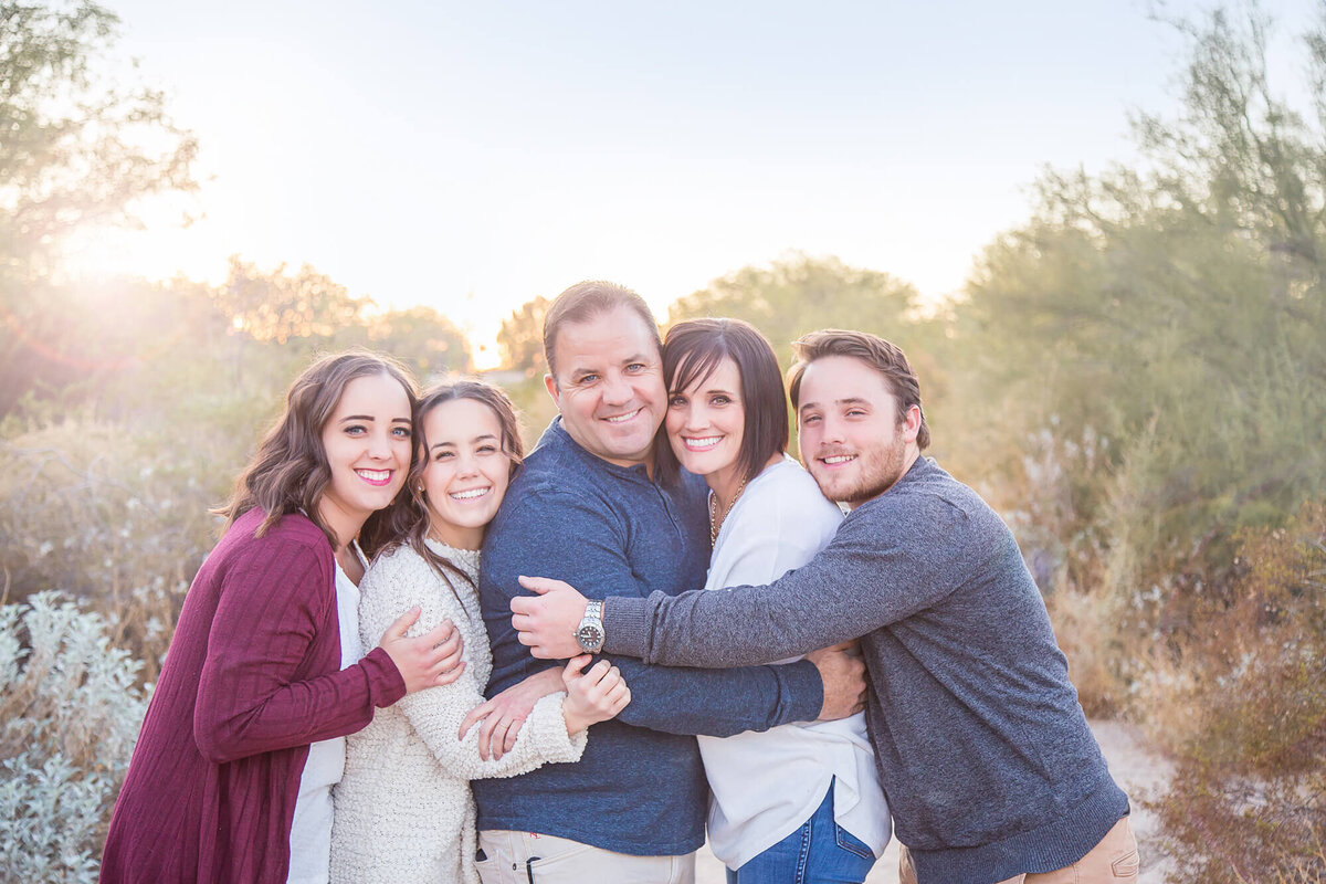 adult family hugging  in desert family portrait by las vegas family photographer, Jessica Bowles