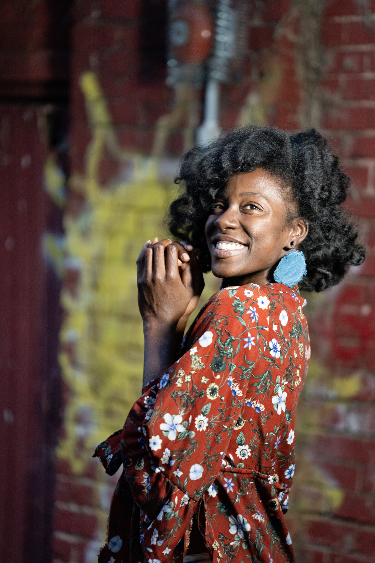Black Female Smiling Colorful Top Portrait