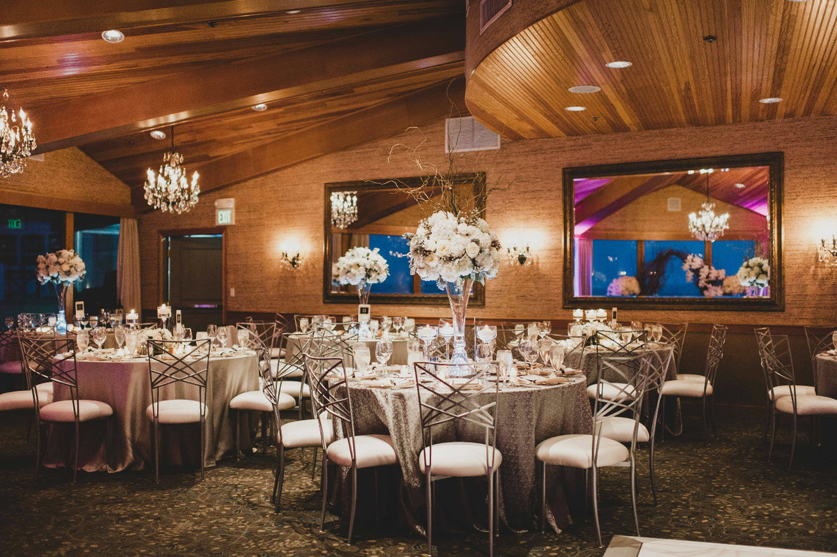 Romantic winter wedding at the Edgewater Hotel Seattle designs by Flora Nova Design with tall, large white centerpieces