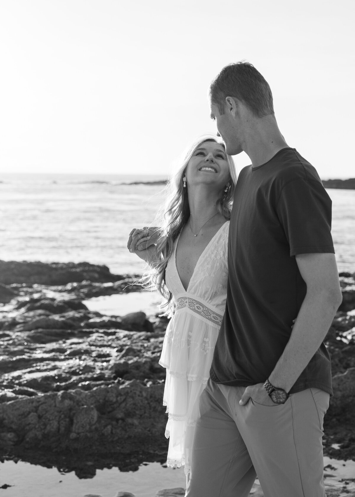 romantic black and white beach engagement photo