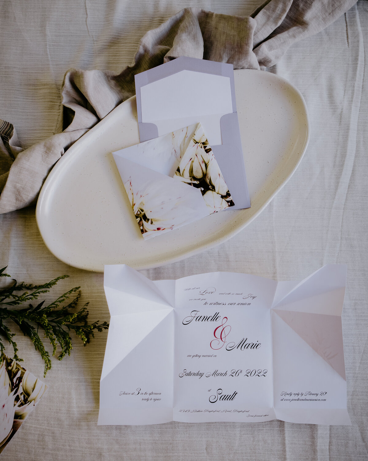 Cream and lavender origami wedding invitation  with elegant cursive font