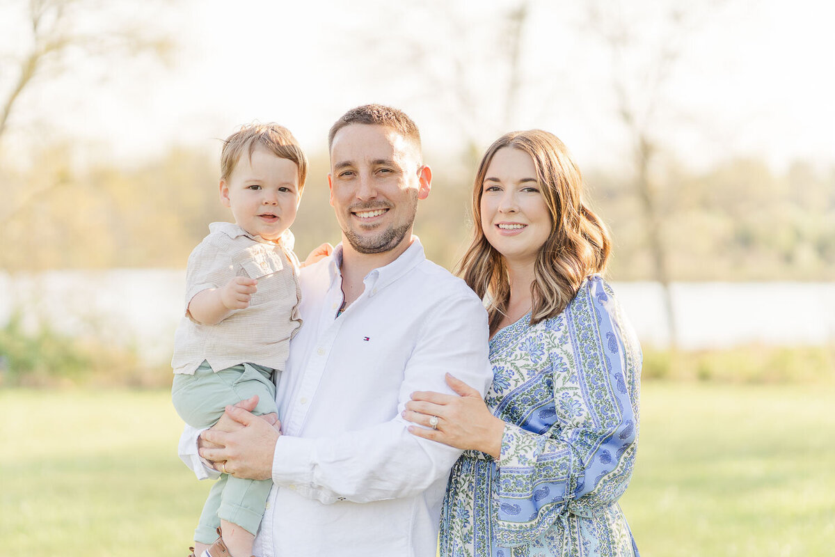 family posing for photos during spring minis taken by South Riding, VA photographer