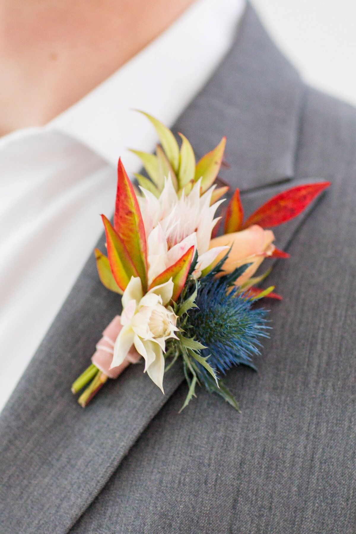 textural fall boutonniere, colorful boutonnieres, studio fleurette, pinewood wedding, minnesota florist