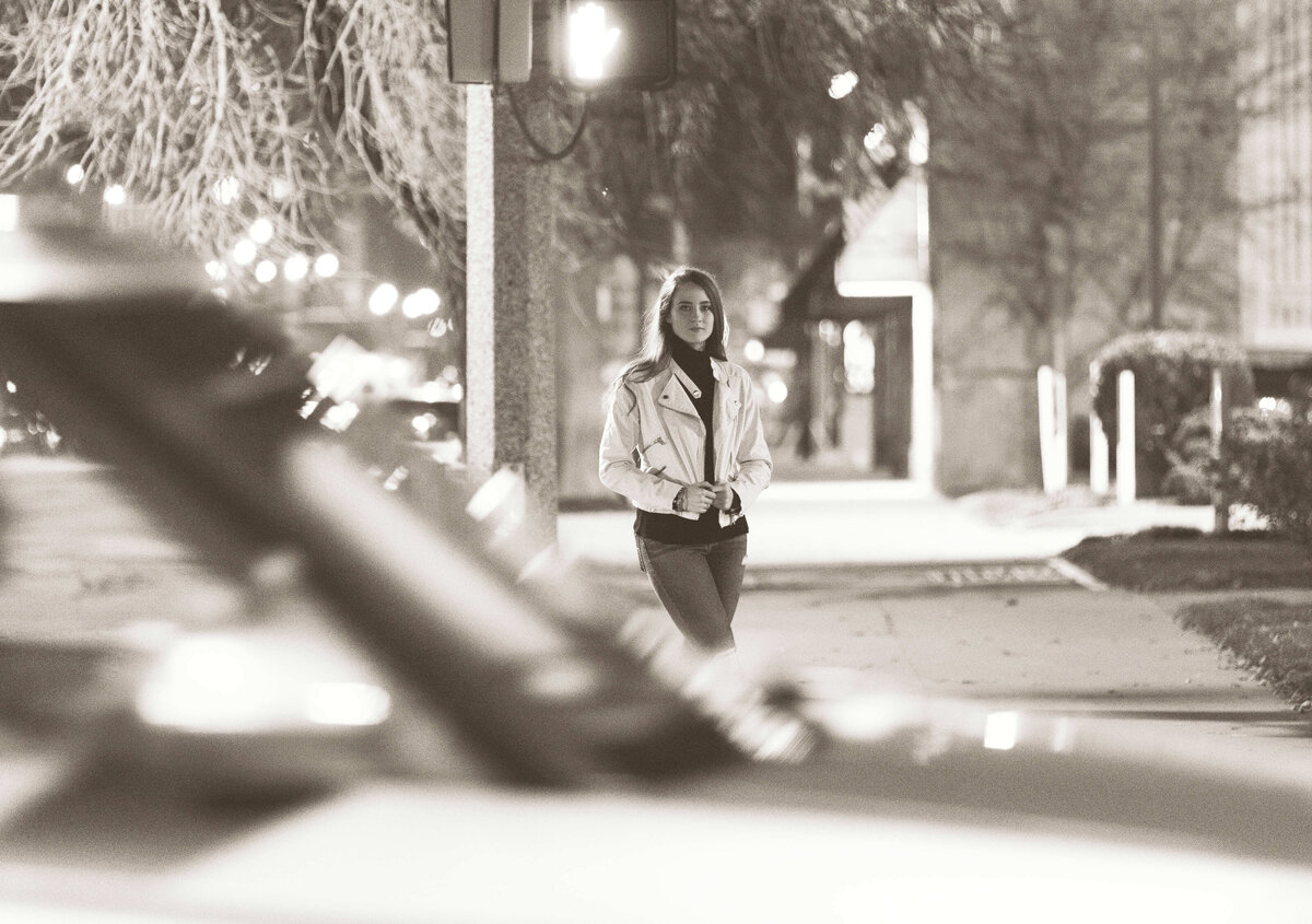 Senior photo of a girl standing on an Erie Pa street corner