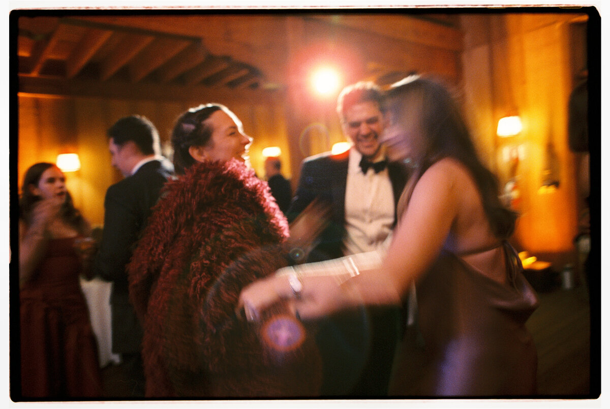Joyful guests captured in an artistic, candid wedding photography style — Carmel wedding photography by Kate Winters Photography.