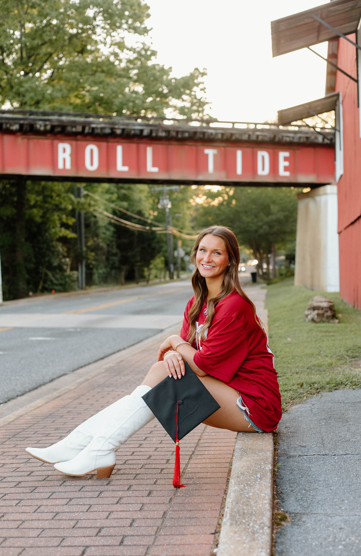 university of Alabama graduate at the roll tide bridge in northport alabama