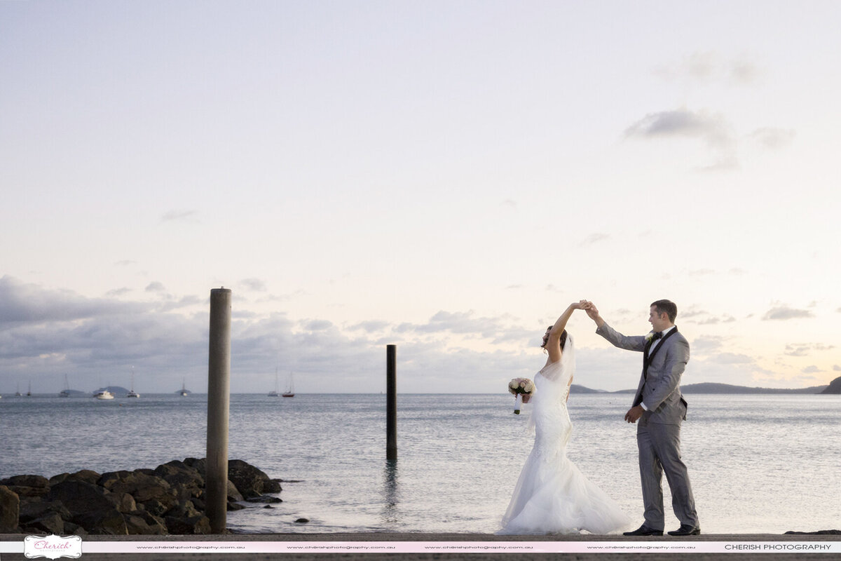 Capture your special day with creative wedding photography at Airlie Beach, Whitsundays - showcasing fine art techniques.