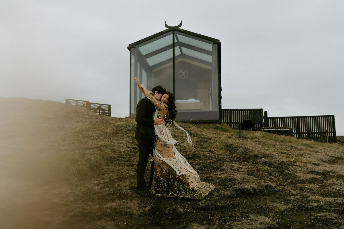 eloping couple at panorama glass lodge iceland