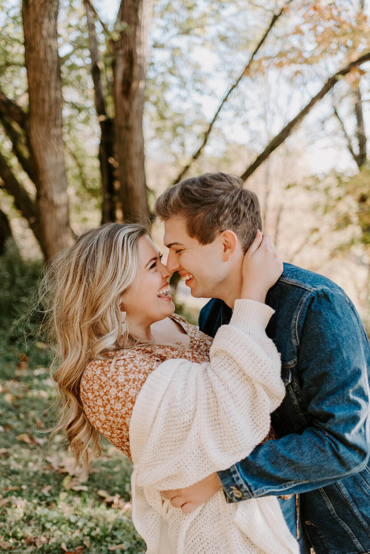 Future bride and groom embracing by engagement photographers nashville