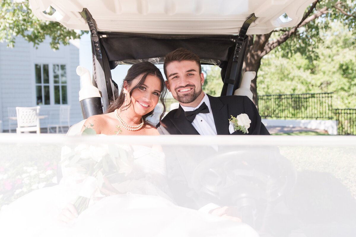 cute couple on golf cart