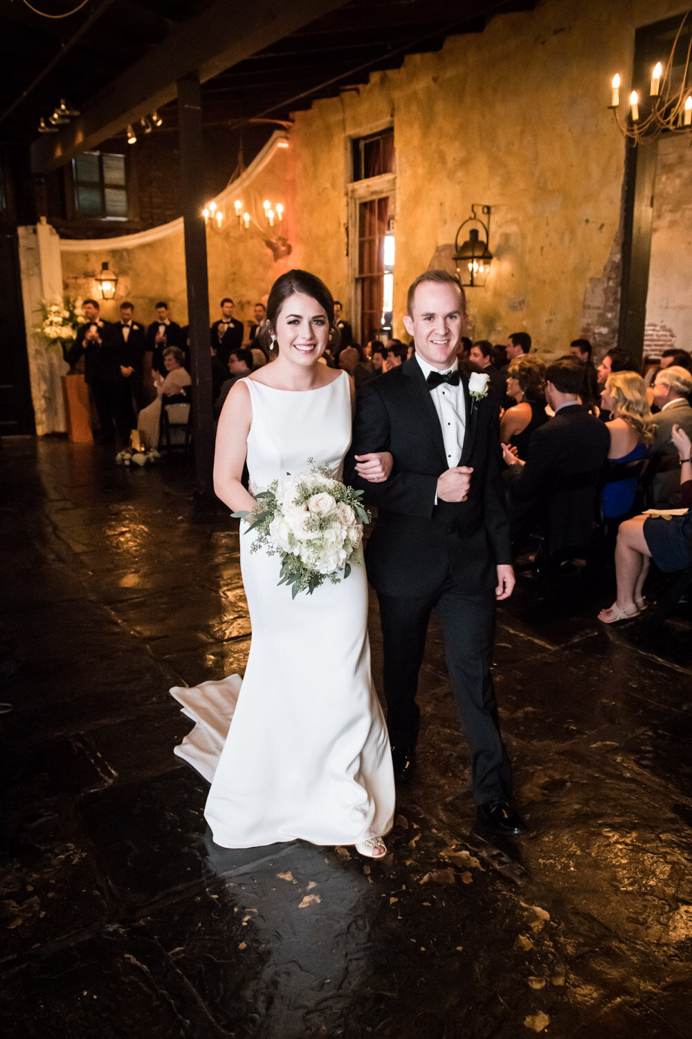 Bride and groom walk down the aisle at end of ceremony at Latrobe's