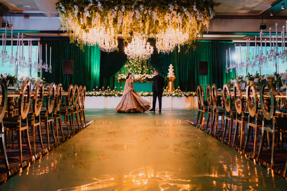 emerald-green-gold-luxury-reception-vinyl-floor-bride-groom-dance-candelabras-chandelier