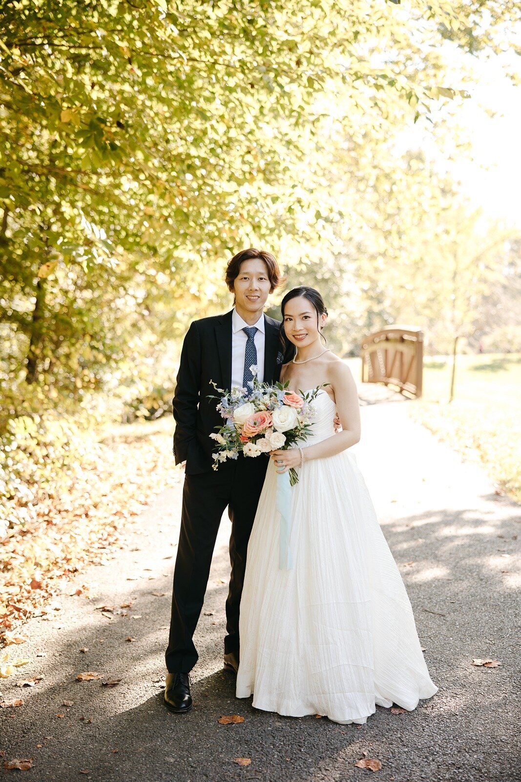 Portrait of bride and groom in an outdoor venue