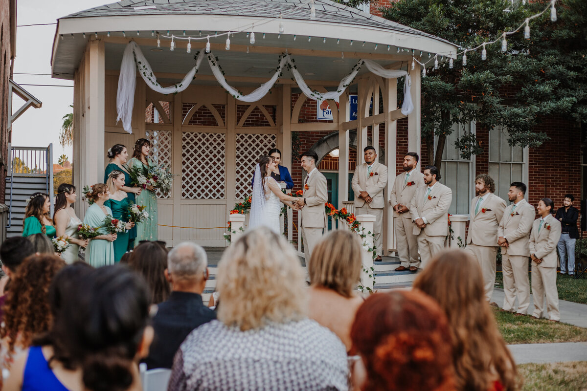 As a wedding photographer capturing the magic of a Houston wedding in Galveston, TX, I was swept away by the infectious energy of the dance floor. From the bride's graceful twirls to the groom's enthusiastic footwork, every move reflected the sheer joy and love radiating from the couple and their lively wedding party.