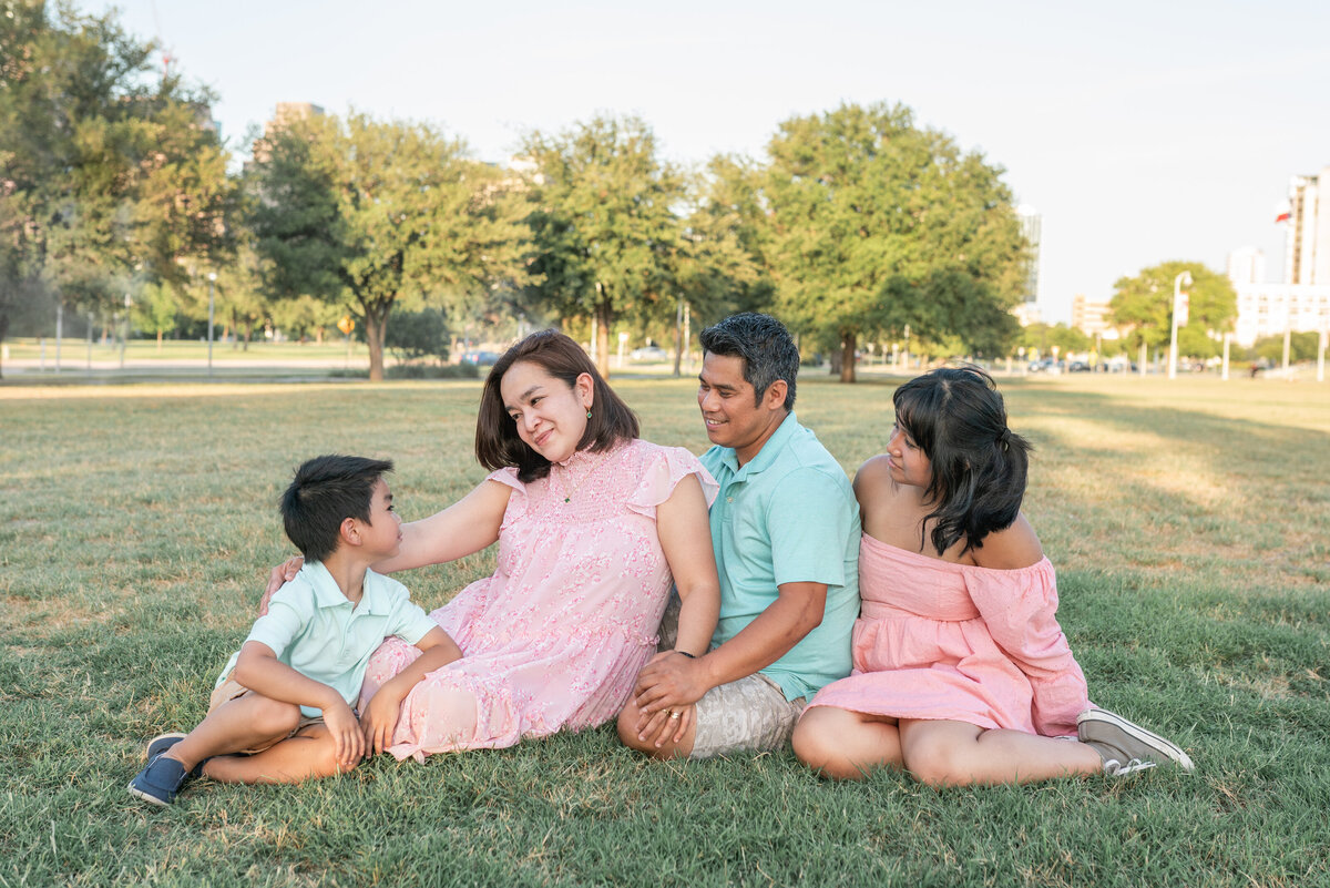 Austin Texas Family photo in front of Austin Skyline.