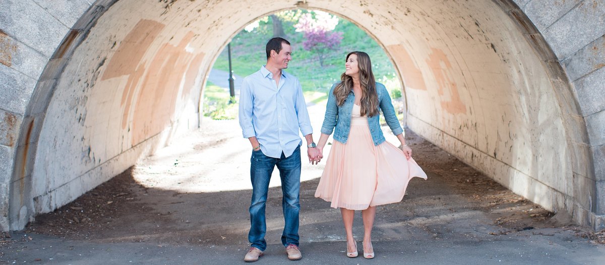 Couple Walking under tunnel in Hudson River Greenway in New York City Image photo