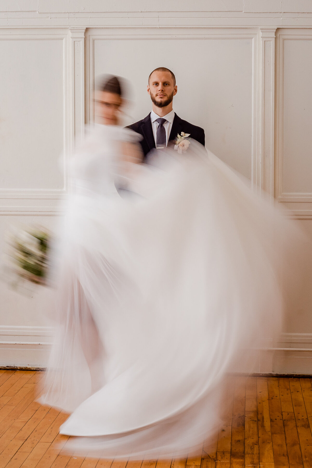 A photograph of a bride and groom using slow shutter speed.