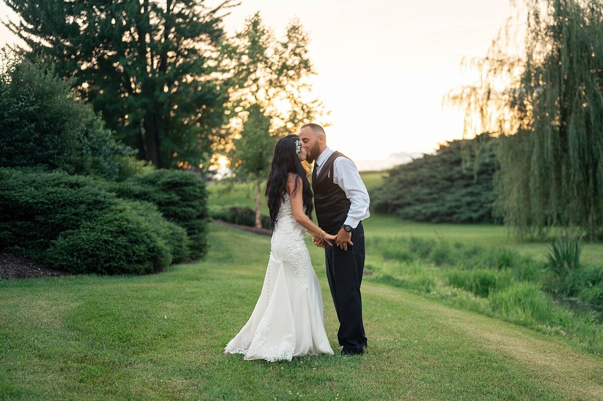 Sunset wedding portraits by Samantha Walker at Everhart Gathering Place in Ohio