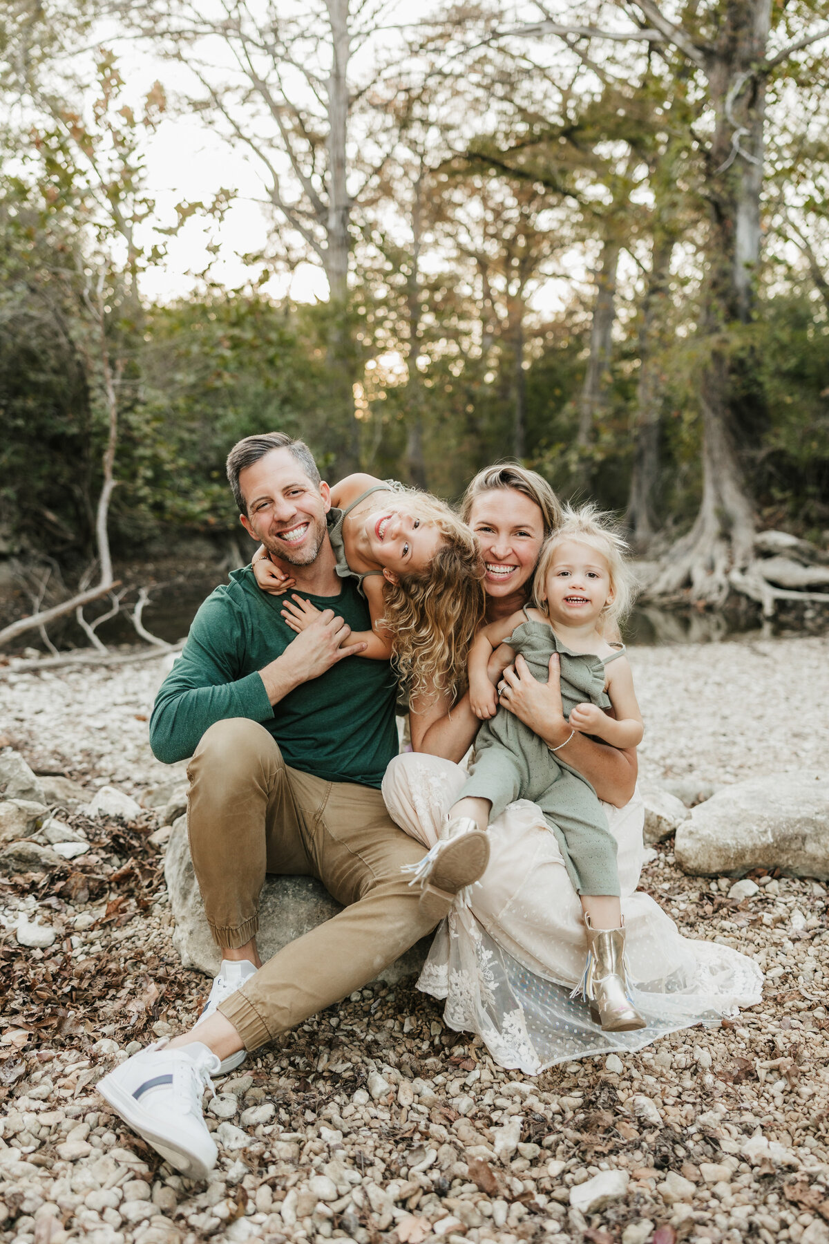 cute-family-smiles-in-photo