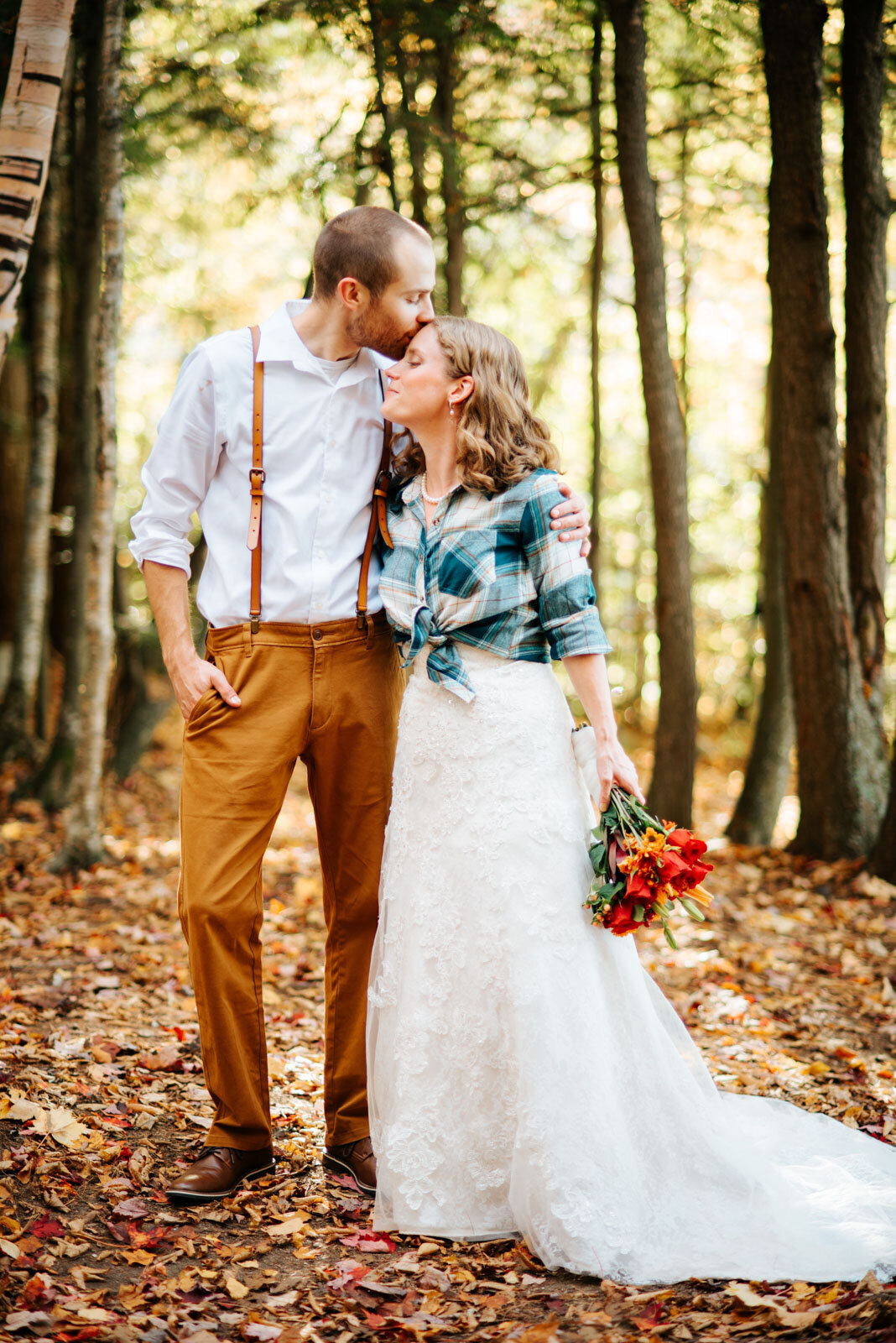 adventurous bride and groom in the woods camping elopement