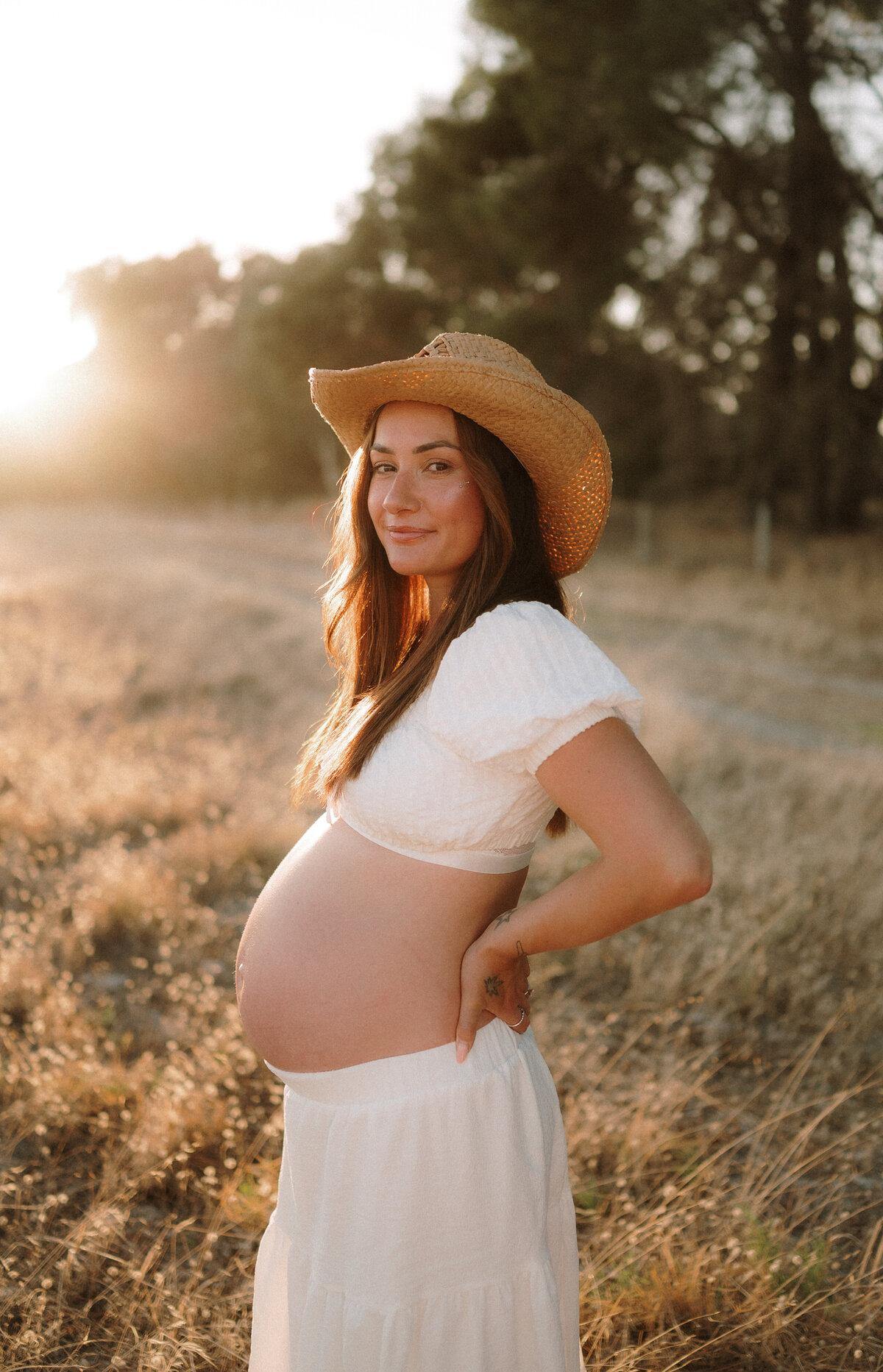 Expecting mother during golden hour maternity session in Perth