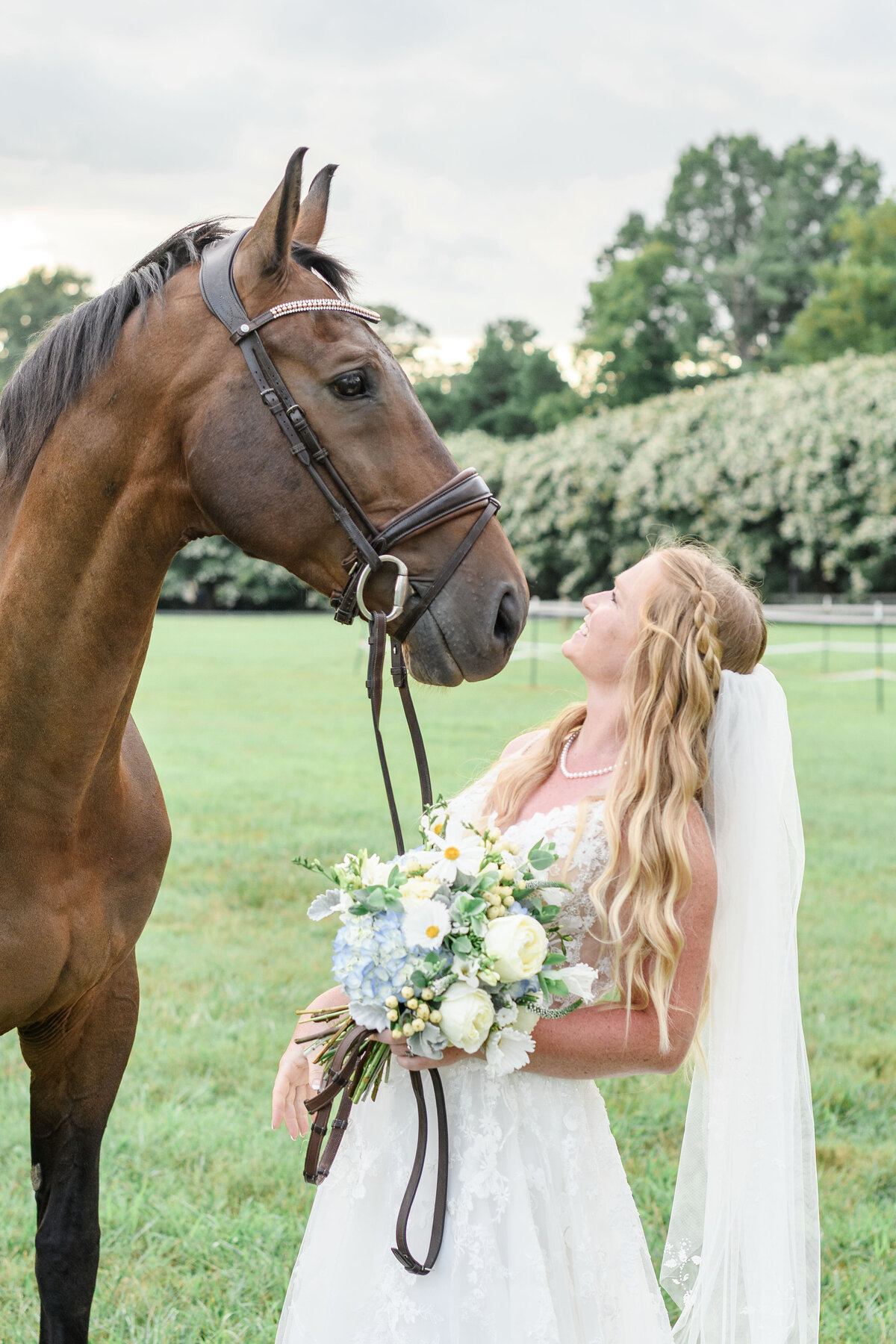 Bridal portraits with her horse on a Lancaster, Virginia private estate. 