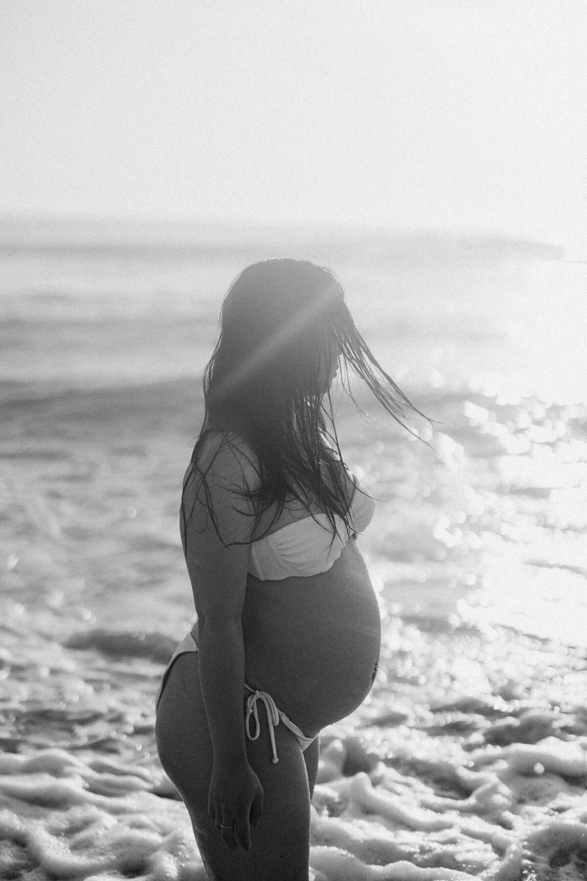 pregnant mother on a beach