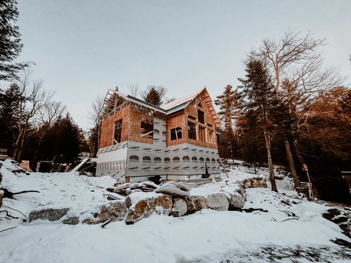 Premium home construction in Haliburton Highlands featuring fine woodworking and detailed exterior architecture.