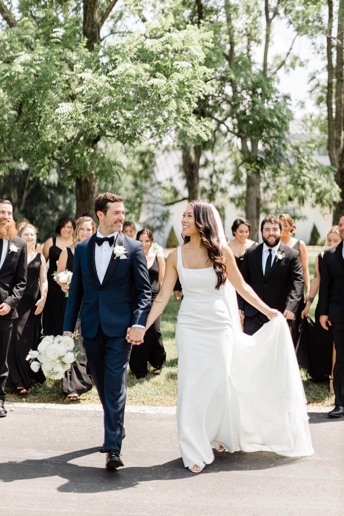 Michelle Kochvar wedding - bride and groom walking
