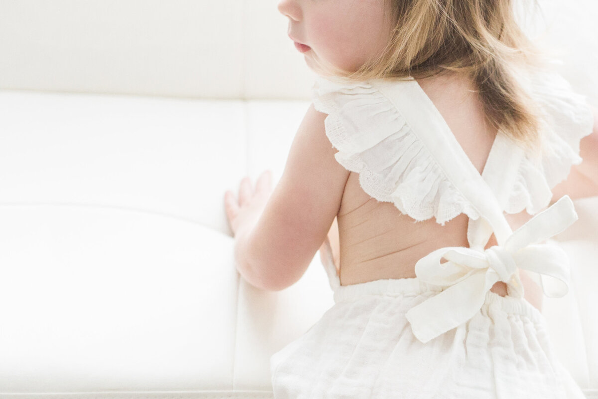 detail of baby rolls on back 