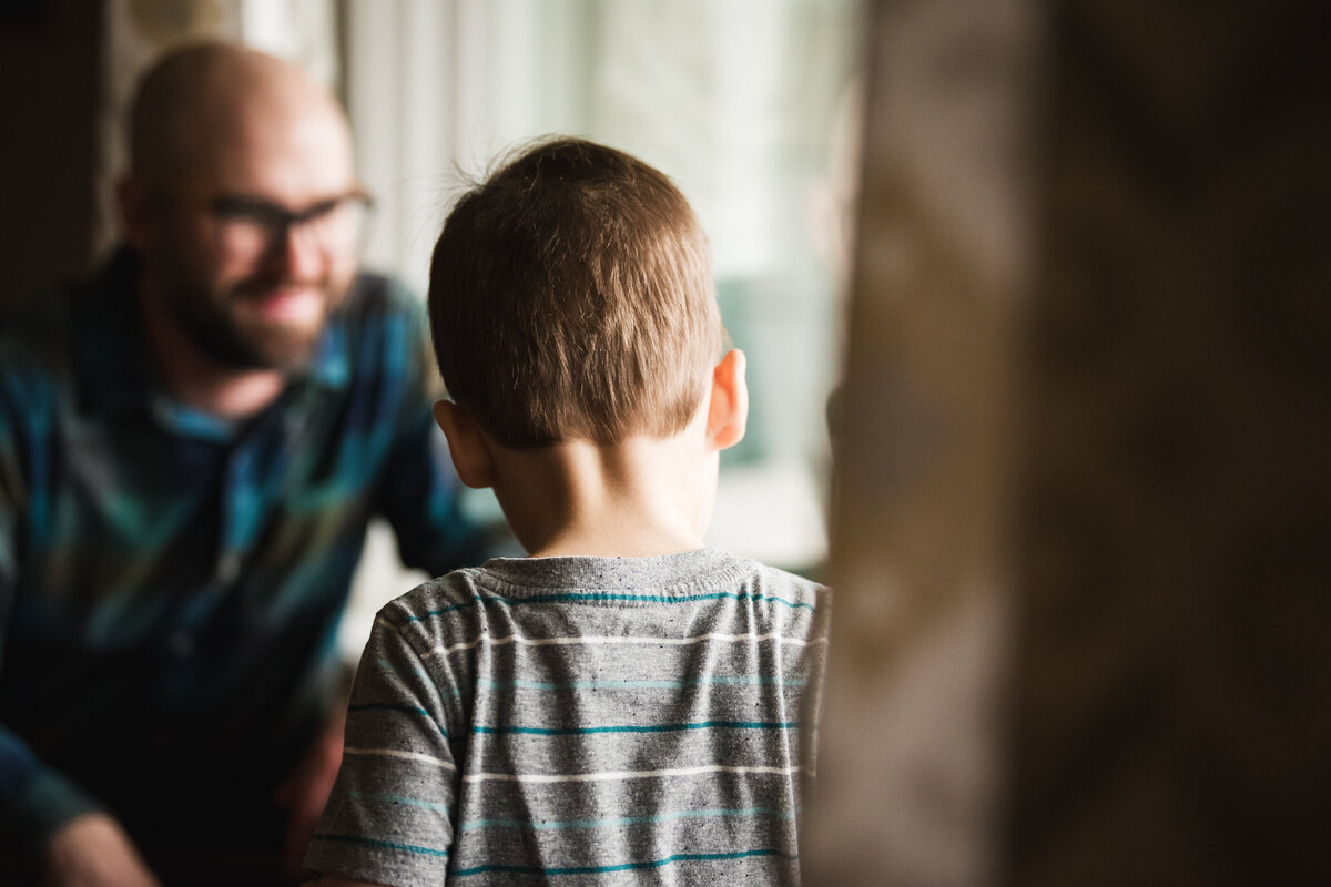 dad and child playing together