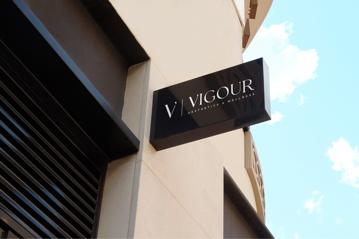 Vigour Aesthetics & Wellness mockup on a sign