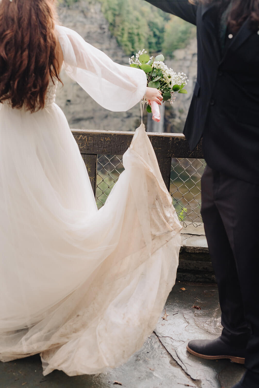 groom spinning bride around