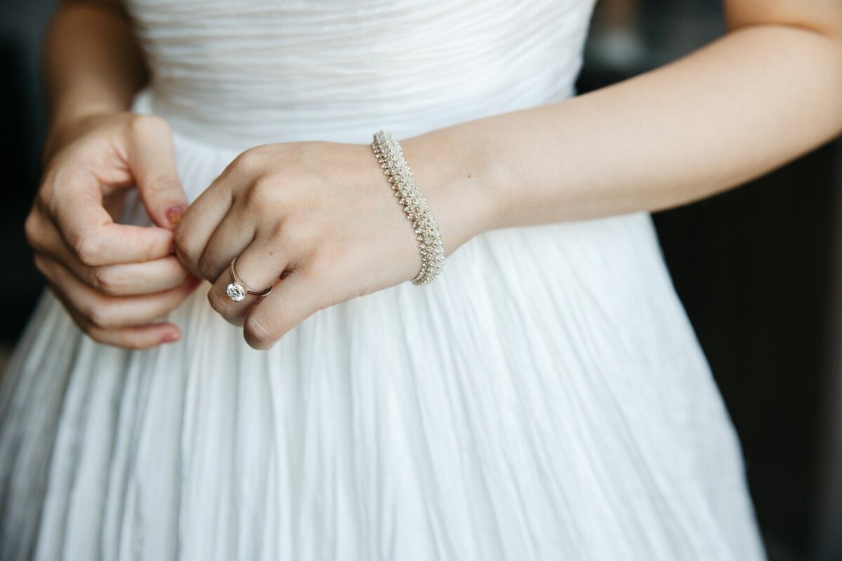Brides beautiful bracelet and engagement ring