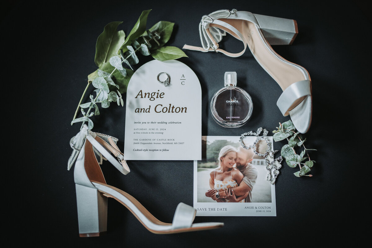Flat lay for a bride and group with a black background in Minneapolis, Minnesota.