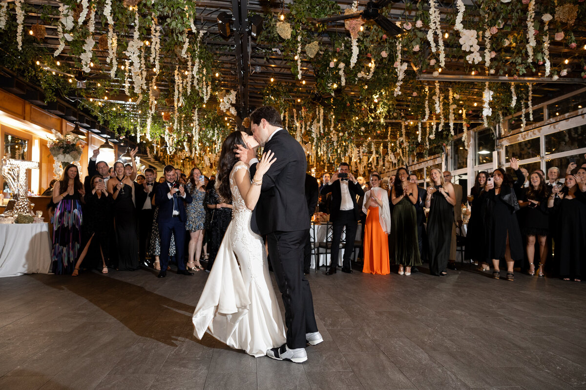 sarah and mark kiss during their first dance
