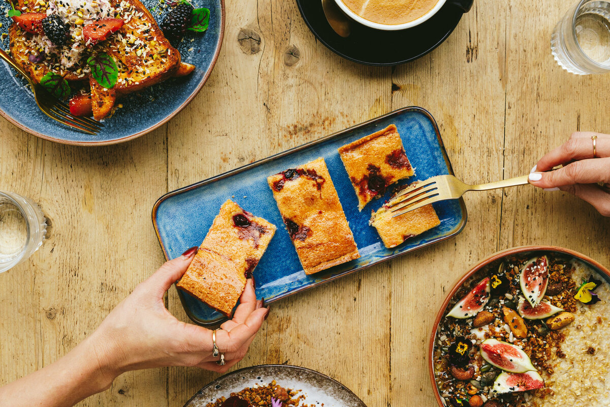 Cafe Brunch Sharring a Cake Slice