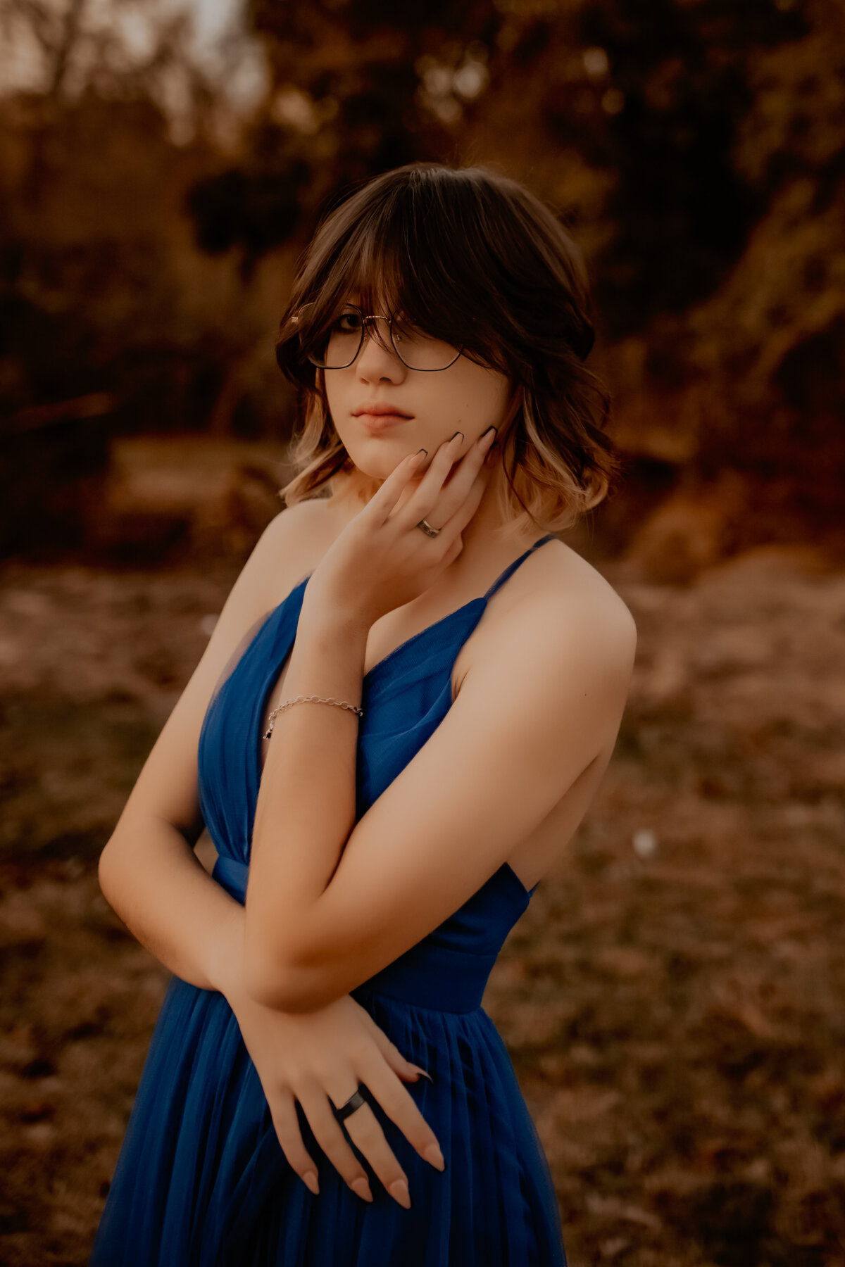 Livingston, Tx girl in blue dress at sunset photos