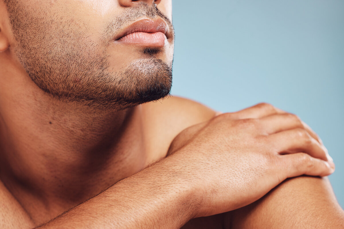 Close-up of male model's jawline and beard