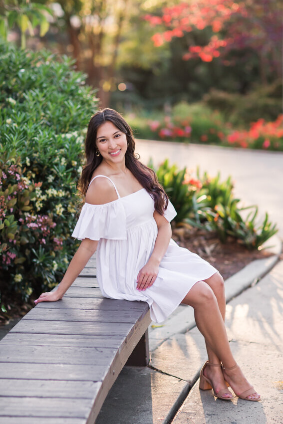 San Diego State senior sitting on bench