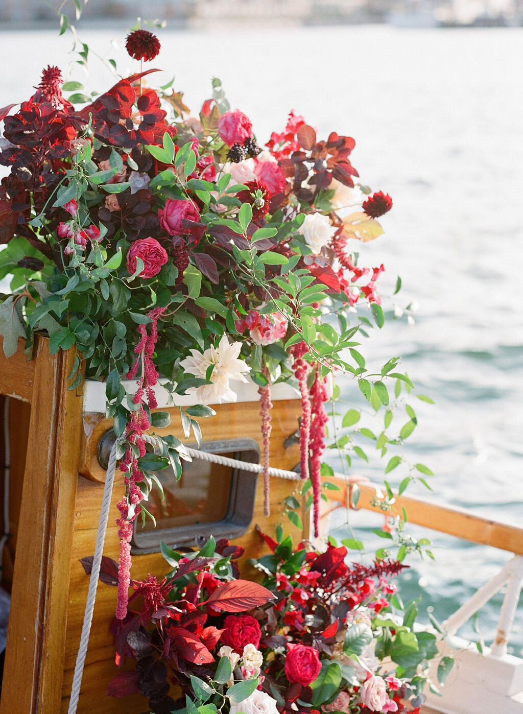 Kate-Murtaugh-Events-Boston-Harbor-sail-boat-yacht-elopement-wedding-planner-grooms-ocean-floral-installation