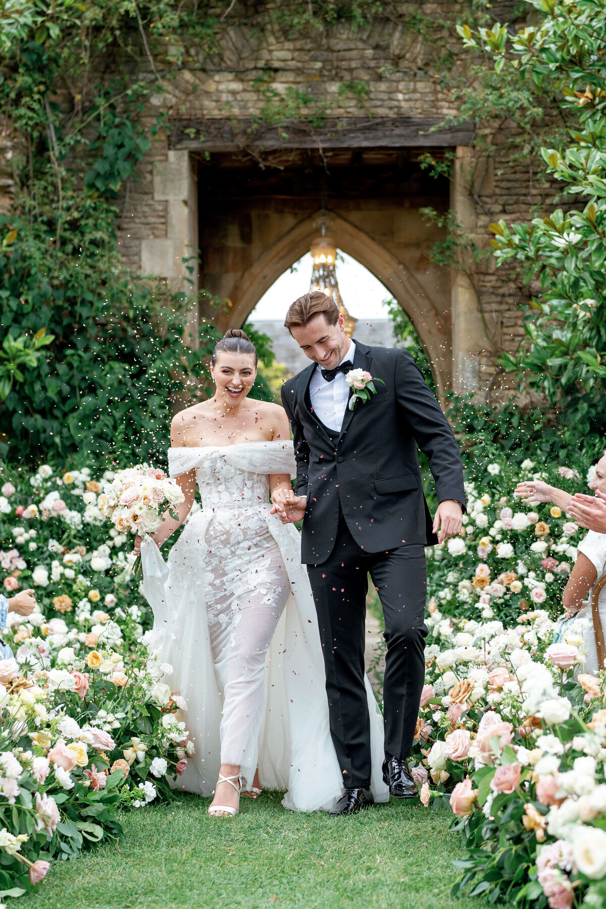 Wedding ceremony outdoors in the garden at Euridge Manor