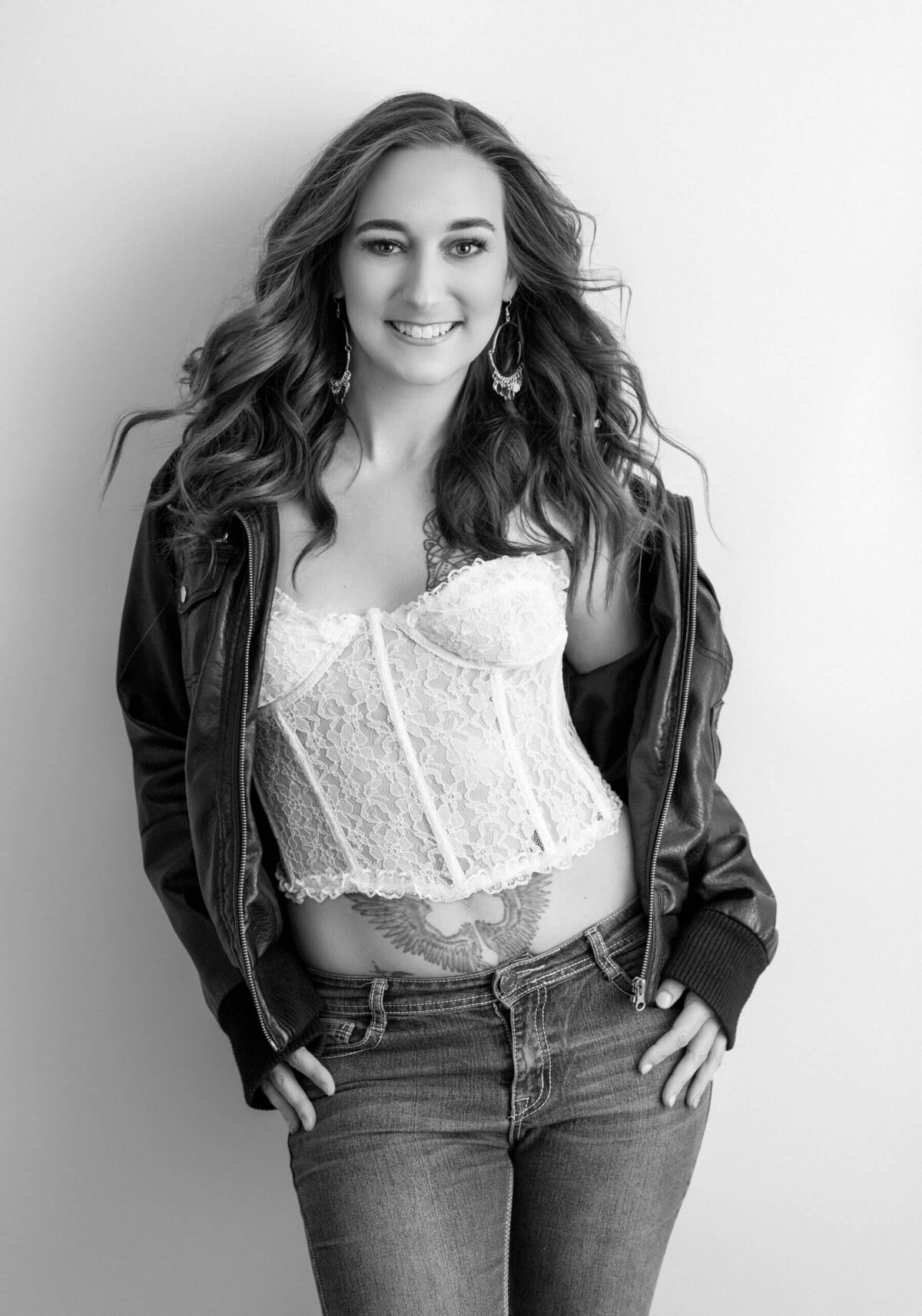 Powerful and Confident Portrait – A modern woman exuding strength in a studio setting.