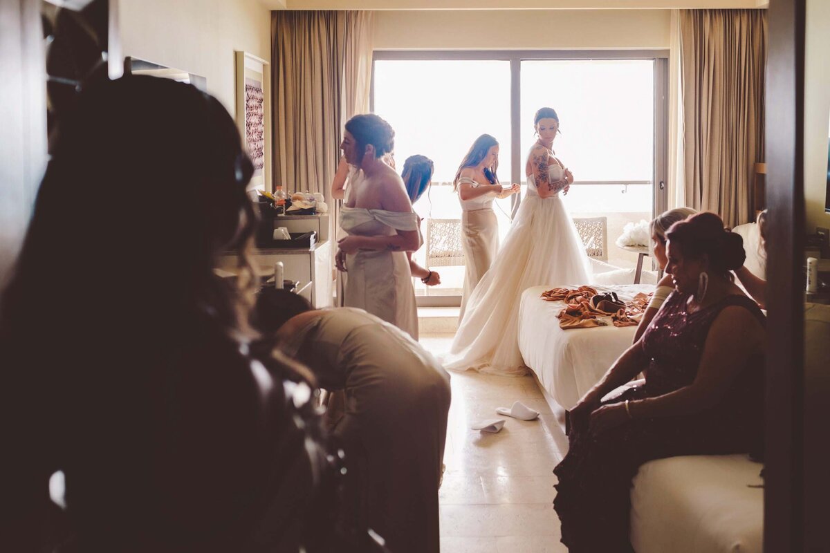 Bride getting ready in room at Hyatt Ziva in Cancun
