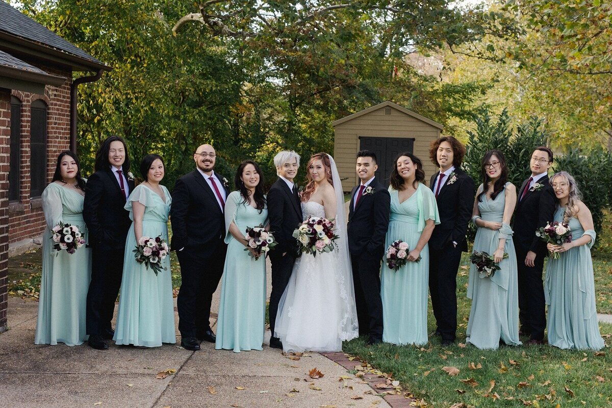 Bride and groom photo with wedding party matching up