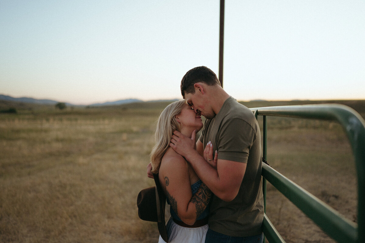 Couple during golden hour engagement shoot in Idaho wedding/elopement - photographed by The Storytellers