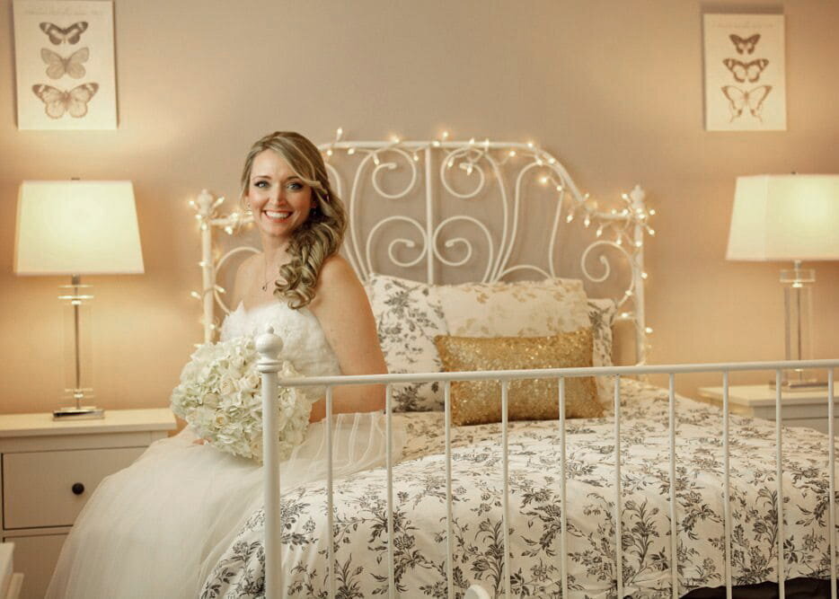 Bride Smiling with Flowers