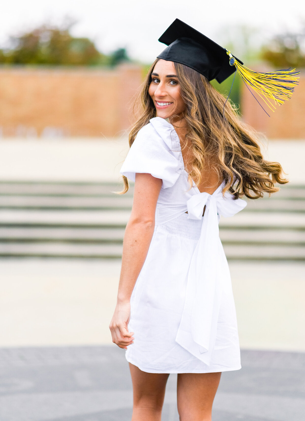 high school senior girl with graduation cap