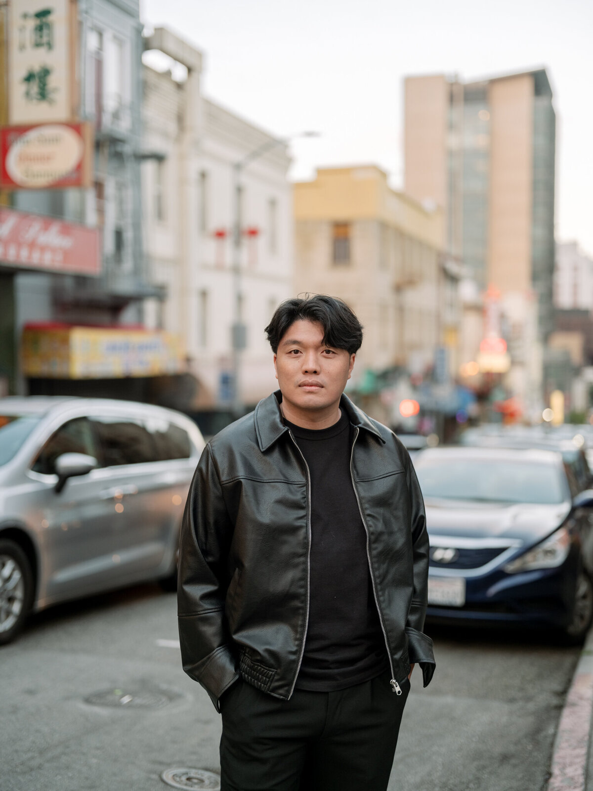 Black leather jacket fashion at urban san francisco engagement session